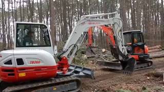 Kubota KX057 4 VS Takeuchi TB260 Mini Excavator Show Down [upl. by Nnaillek32]