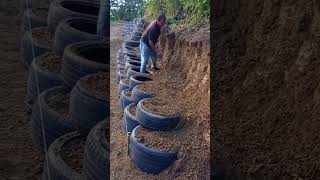 Slope protection building process with tires [upl. by Zenger]