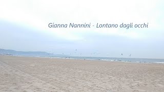 Gianna Nannini  Lontano dagli occhi  Lyrics [upl. by Aslam]