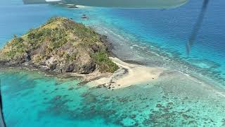 Scenic flight over celestial Kadavu Island Group and landing at Kokomo Private Island Resort Fiji [upl. by Rhyne171]