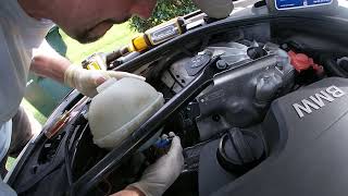 BMW 528i Low Coolant Level Sensor Replacement [upl. by Kirshbaum182]