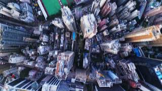 Aerial time lapse footage of Hong Kong city full of high buildings and skyscrapers filmed from above [upl. by Berrie]