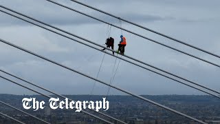 Just Stop oil protesters scale QE2 Bridge at Dartford Crossing [upl. by Ganny]