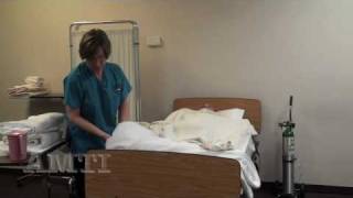 CNA Skills Making an Occupied Bed Making Part 1 [upl. by Liesa]