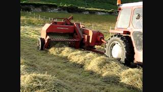 Rowing amp Baling Hay 2 MF 135 and MF 20 Baler 2011 [upl. by Lunnete]