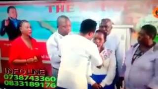 Ghanaian Prophet Nana Poku Heals Woman By Kissing Her During Service [upl. by Eniliuqcaj]