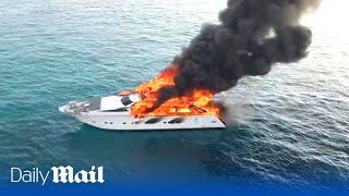 Drone footage of an 88ft luxury yacht blazing before sinking in Mediterranean sea [upl. by Leal985]