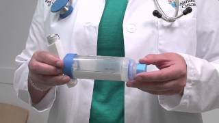 Asthma howto How to use an inhaler with a spacer and mouthpiece [upl. by Anelaj]