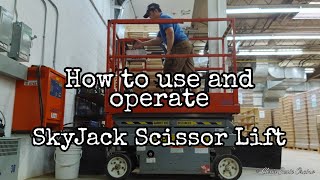 How to use and operate Skyjack scissor lift  Warehouse work [upl. by Ariuqahs955]