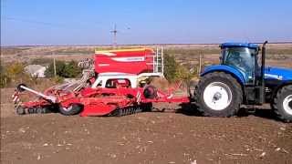 Autumn 2014 barley sowing New Holland T7260 with Poettinger Terrasem C4 Artis [upl. by Llednav]