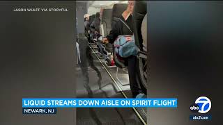 Liquid from bathroom streams down aisles on Spirit Airlines flight [upl. by Taylor]