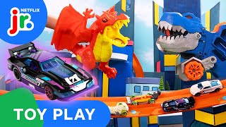 Ultimate TRex Transporter VS Fire Breathing Dragon 🔥 Hot Wheels Lets Race  Netflix Jr [upl. by Vaughan771]