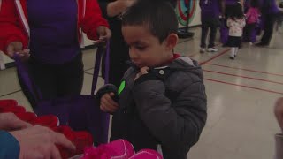 FedEx Cares amp Operation Warm give new shoes to students in Memphis [upl. by Nnylharas808]