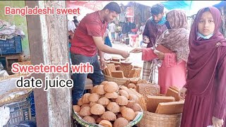 Date molasses Bangladeshi sweets made with date palm water are being sold in the market [upl. by Herwin]