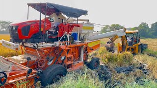 Kubota harvester stuck in mud Rescued by JCB 3DX eco  tractor videos [upl. by Htebyram]