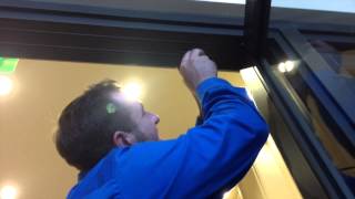 How to adjust a Center Hung Door [upl. by Eirdua]