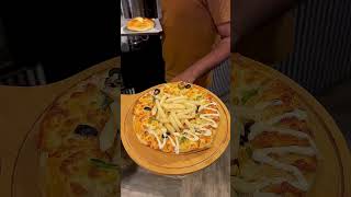 Introducing FRIZZA fusion of crispy fries and savory pizza in one delicious round treat shorts [upl. by Ecienal934]