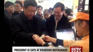 President Xi Jinping eats steamed bun at roadside restaurant [upl. by Sherard15]