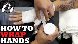 How to Wrap Hands using Tape amp Gauze for Amateur Boxing [upl. by Piefer567]