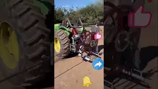 Retrieving irrigation pipes from farmland using a tractor [upl. by Eckel]