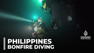 Philippines bonfire diving Push to boost tourism with new trend [upl. by Gaskill682]