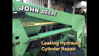 Leaking Hydraulic Cylinder Repair Replacing hydraulic cylinder seals on a John Deere 541 Loader [upl. by Fang205]