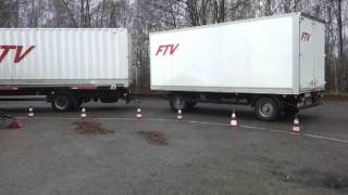 LKW Fahrschule Grundfahraufgabe Gliederzug rückwärts um Kurve schieben [upl. by Zitella506]