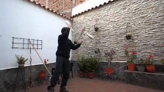 SlackRoutine 3 club juggling tricks head backcross [upl. by Leibman]