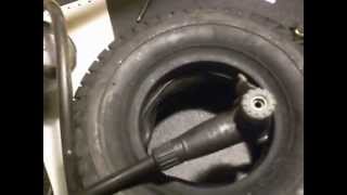 49cc standup gas scooter Back Tire replacement part 1 [upl. by Murdock]