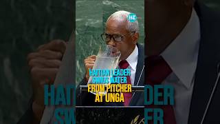 Thirsty Haitian Leader Swigs Water From Pitcher Drenches Himself At UNGA [upl. by Adnahsat12]