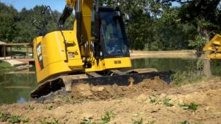 The Cat® 315F Hydraulic Excavator Pushing Dirt [upl. by Ttenyl]