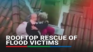 Helicopter makes dramatic rooftop rescue of flood victims in Brazil [upl. by Garber974]