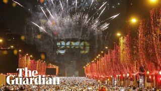 Arc de Triomphe lights up for new year in Paris [upl. by Ellasal]