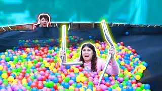 TRAMPOLINE ALMOST KILLED US SO WE KILLED IT  10000 BALL PIT BALL IN TRAMPOLINE [upl. by Cofsky]