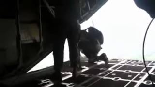 Jumpmaster Gets Sucked Out of a Plane When His Parachute Deploys Early [upl. by Oruasi]