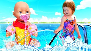 Kids play with dolls amp Feeding baby dolls at the swimming pool  Baby Born doll amp Family fun video [upl. by Eneles]