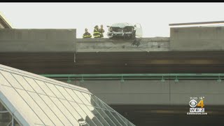 Car sends concrete barrier crashing down onto Alewife MBTA station [upl. by Anayia210]