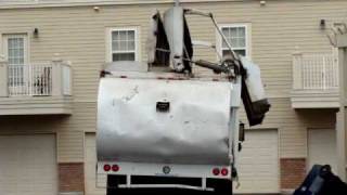 Garbage truck drops container in the hopper [upl. by Ezirtaeb653]