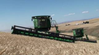 John Deere STS combines equipped with Hillco Hillside Leveling Systems [upl. by Kaehpos792]