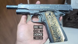 John Wayne colt 1911 co2 BB air pistolairgun with custom gold grips in India no license needed [upl. by Atikal]