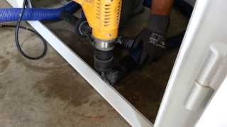 Drilling Holes for Wedge Anchors in an Above Ground Safe Room that Bolts Together w Shop Vac [upl. by Rafi]