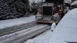 big rig truck pulls 18 wheeler uphill in snow [upl. by Ninon]