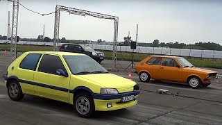 Peugeot 106 Sport vs VW Polo 1 Drag Race Acceleration [upl. by Ioyal832]