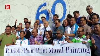 MCAs 60000 palm print mural for National Day [upl. by Anaoy]