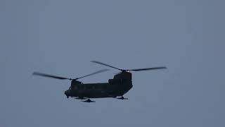 A Chinook Helicopter With Skies Flies Over Saskatoon helicopter army chinook [upl. by Seyah]