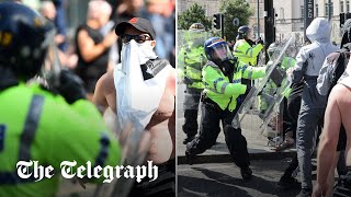 FarRight groups clash with police as unrest spreads across UK [upl. by Adnarym762]