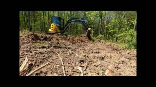 Deere 35G Mini Excavator Removing Stumps amp Grading [upl. by Charmane]