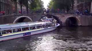 Canal cruises in Amsterdam busy at the 7 bridges [upl. by Ahsiken746]