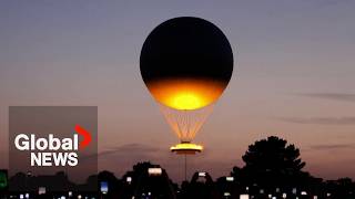 Olympic cauldron rises in hotair balloon above Paris delighting onlookers [upl. by Narah393]