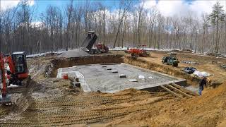 Putting Stone Into The Foundation Hole To Get Ready For Laying Some Block [upl. by Reldnahc]